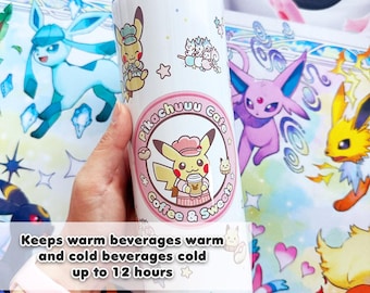 May include: White insulated tumbler featuring Pikachu Cafe graphics. The tumbler has a pink and white circular logo with a Pikachu character holding a coffee cup. The text "Keeps warm beverages warm and cold beverages cold up to 12 hours" is also visible.