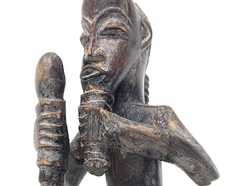 Intricate Heddle Pulley with Male Figure and Staff