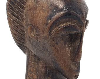 Heddle Pulley with Anthropomorphic Head