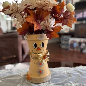 Fall Leaf Scarecrow Flower Pot – Fall & Harvest Decoration