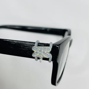 May include: A rustic wooden sign with the text "Welcome to our home" in white lettering. The sign features a distressed finish and a simple, inviting design, perfect for front door decor.