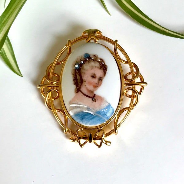 Edgar Berebi Limited Edition Brooch With Limoges Hand Painted Porcelain— Ornate Gold Tone Brooch with Women in Blue Dress Miniature