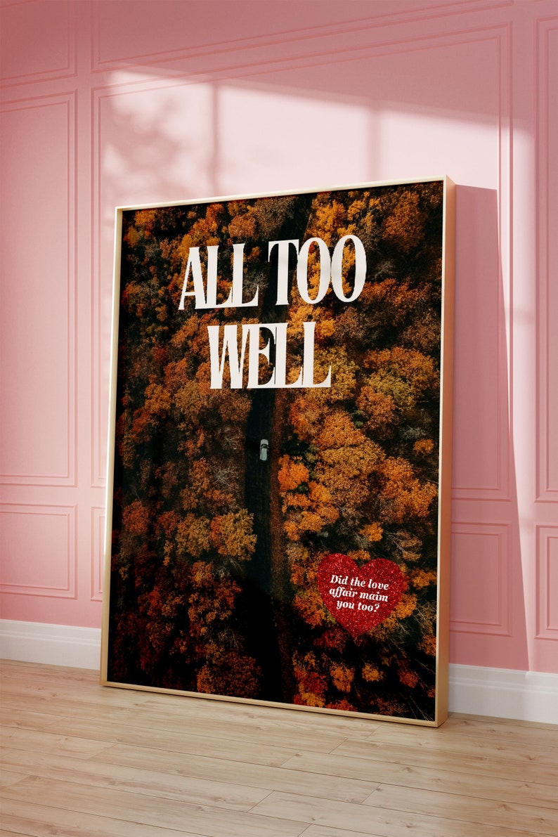 May include: A framed print with an aerial photograph of a forest in autumn colors. The text "ALL TOO WELL" is printed in white on the image. A red heart with the text "Did the love affair maim you too?" is in the lower right corner of the image.