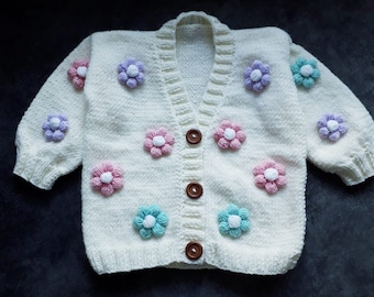 Cardigan Baby in lana merino con fiori ricamati