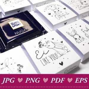 May include: A set of small white boxes with bunny illustrations and Easter greetings. The boxes are decorated with black ink and hearts. One box contains a chocolate bar. The chocolate bar is wrapped in blue foil with the words "Ritter Sport" and "Nugat" printed on it.