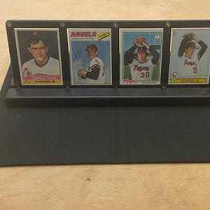 Nolan Ryan Framed Set of Four Authentic, Unaltered Baseball Cards - Topps #330 1976, Topps #650 1977, Topps #400 1978, Topps #115 1979