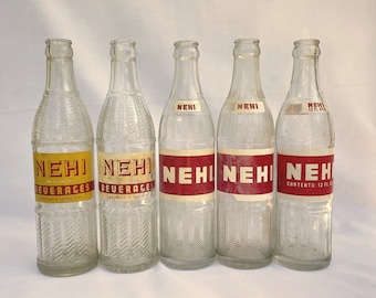 Vintage 50s and 60s Nehi soda bottles, ACL