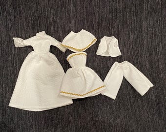 Vintage handmade white outfits for Barbie from the 1970s