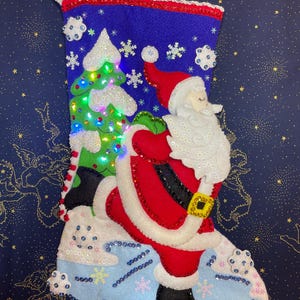 Bucilla Christmas felt stocking “Skating Santa” 89479E Completed Finished Product with Christmas lights