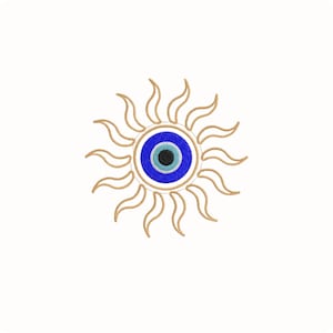 May include: Embroidered sun design featuring a blue eye in the center, surrounded by a gold-colored sunburst pattern. The eye has a blue iris, a black pupil, and a light blue highlight. The design is on a white background.