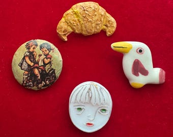 Botones infantiles de pelícano con forma de croissant de cara surtidos, se venden por separado. Estudio