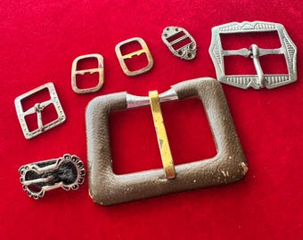 Conjunto de hebillas vintage, colección de cuero, metal y estilo victoriano.