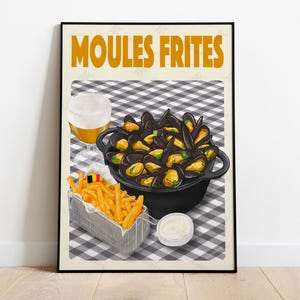 May include: Poster print featuring a black pot of mussels, a basket of fries, a glass of beer, and a small dish of sauce. The words "MOULES FRITES" are at the top in orange letters. The background is a checkered pattern.