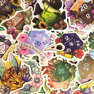 May include: A collection of colorful stickers featuring fantasy-themed designs. The stickers include various polyhedral dice, floral arrangements, and whimsical creatures like snails and bees. Some stickers have text that reads "This is how I roll."