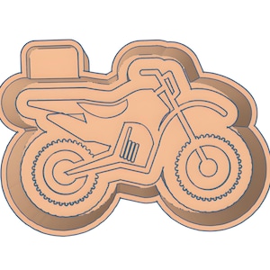 May include: A tan-colored motorcycle-shaped cookie cutter. The cutter features a detailed outline of a motorcycle, including wheels, handlebars, and engine components. The design is suitable for creating motorcycle-themed cookies or decorations.