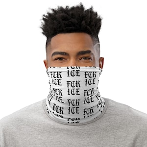 May include: White face covering with the words "FCK ICE" in a repeating pattern in black gothic font. The face covering is worn by a person with dark hair and a gray shirt.