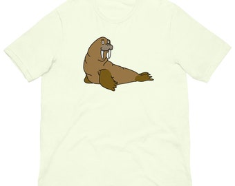 Peut inclure: Un t-shirt vert clair avec une illustration de dessin animé d'un morse brun avec de grandes défenses.