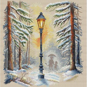 May include: Cross-stitch depicting a winter scene with a blue lamppost and a lit, yellow lantern. Snow-covered trees frame a path where two figures walk under an umbrella. The background has a soft, yellow glow, suggesting a sunset.