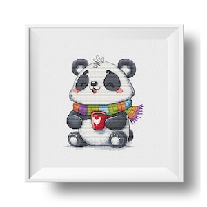 May include: A cute cartoon panda wearing a colorful scarf and holding a red mug with a heart on it.
