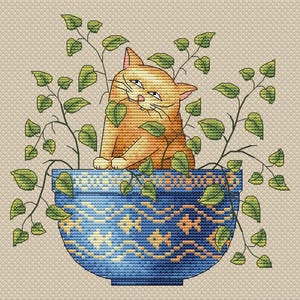 May include: Cross-stitch design featuring an orange cat in a blue decorative pot with green vines. The pot has a yellow and white geometric pattern. The background is a light beige colour.