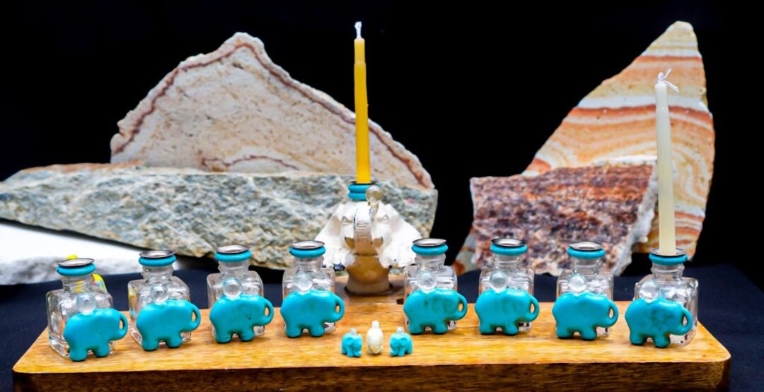 Turquoise Elephant Menorah. Lucky Elephants Light the Way for Hanukah
