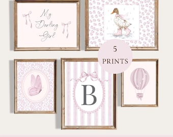 May include: Five framed pink vintage prints. The prints feature a duck in rain boots, a butterfly, a hot air balloon, the letter "B", and the text "My Darling Girl". The prints are in wooden frames.
