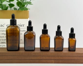 Minimalistische Braunglas-Tropfflasche, nachfüllbare Serumflasche mit schwarzem Kunststoff-Tropfverschluss, leere Hautpflegeverpackung, Tinkturflaschen