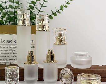 Luxus-Hautpflegeverpackung mit Goldverschluss, nachfüllbare Milchglas-Lotion-Pumpflasche, feiner Nebelsprühflasche & Cremetiegel, Kosmetikbehälter