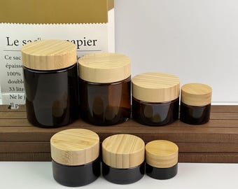 Frascos de vidrio ámbar para crema con tapas de bambú: varios tamaños para productos de cuidado de la piel, velas y almacenamiento. Recipientes ecológicos, reutilizables y herméticos.