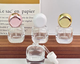 30 ml Klarglas-Tropfflasche, nachfüllbare Serumflasche, leere Hautpflegebehälter mit goldweißem oder roségoldenem rundem Verschluss, Tinkturflaschen