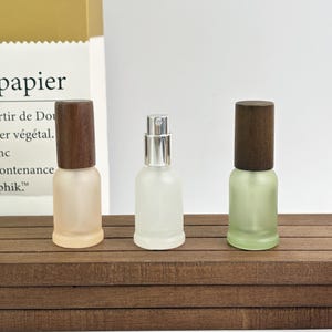 Pastel frosted glass spray bottle & roller bottles (wood caps) – sleek design for fragrances, facial mists, or personal care