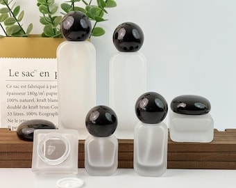 Envases de vidrio esmerilado para el cuidado de la piel, botellas rellenables para loción y espray, tarros de crema vacíos con tapas de plástico negras, envases de cosméticos de viaje.