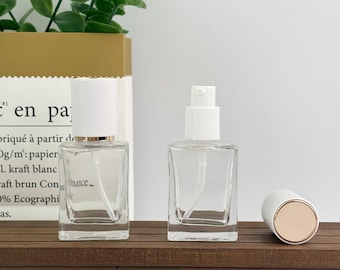 Botella cuadrada de vidrio transparente de 30 ml para loción con tapa blanca texturizada, dosificador rellenable, envase de viaje para el cuidado de la piel con manteca corporal.