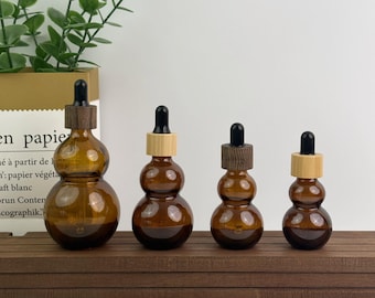 Envase gotero de vidrio ámbar con tapa de madera, rellenable para sueros y aceites, ideal para el cuidado de la piel, frascos de tintura a prueba de fugas.