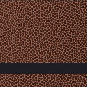 May include: A brown leather background with a black stripe across the middle. The background has a textured pattern of small circles.