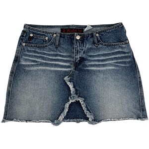 May include: A blue denim mini skirt with frayed edges and a distressed look. The skirt has a button and zipper closure and a "B Mudd Va" label on the back.