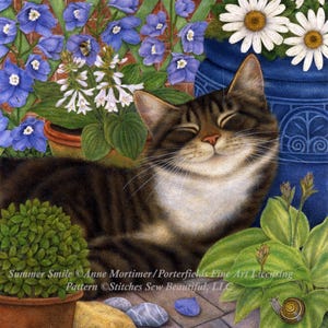 May include: A brown tabby cat with white markings is lying down with its eyes closed. The cat is surrounded by green plants and flowers, including blue forget-me-nots, white flowers, and a white daisy. The cat is resting on a stone path with a blue flower petal nearby.