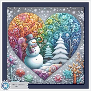 May include: A colorful heart-shaped design with swirls and vines, featuring a snowman in the center. The background is a snowy scene with small trees and snowflakes.