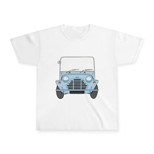 May include: White t-shirt featuring a light blue illustration of a classic car. The car has a windshield, headlights, and a front grille. The design is centered on the shirt, offering a clean and simple aesthetic. The shirt is made of a soft, comfortable material.