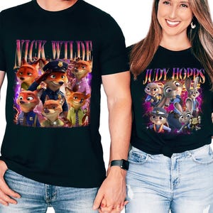 May include: Black t-shirts with characters from the animated film Zootropolis. One shirt says "NICK WILDE" with fox characters, the other says "JUDY HOPPS" with bunny characters. Both shirts have a purple and yellow lightning design.