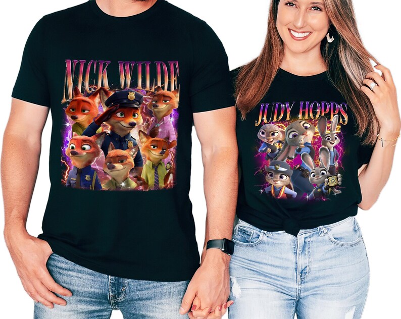 May include: Black t-shirts with characters from the animated film Zootropolis. One shirt says "NICK WILDE" with fox characters, the other says "JUDY HOPPS" with bunny characters. Both shirts have a purple and yellow lightning design.