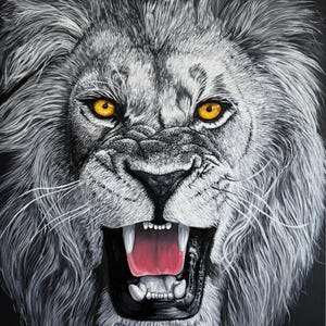 May include: A close-up of a roaring lion's face. The lion has a white mane and black fur. The lion's eyes are bright yellow and its mouth is open, revealing sharp teeth and a pink tongue.