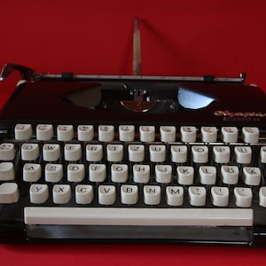 Vintage Olympia Splendid 66 black Typewriter
