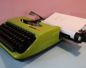 Vintage Privileg 300 brillant green typewriter in excellent condition