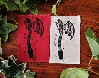 tough and edgy bat wing axe ! hand printed punk patch hell yea