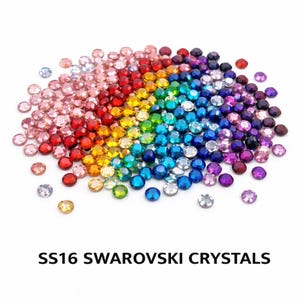May include: A vibrant assortment of SS16 Swarovski crystals, showcasing a spectrum of colours from pink to purple. The round, faceted crystals are arranged in a rainbow pattern. The text "SS16 SWAROVSKI CRYSTALS" is displayed below the crystals.