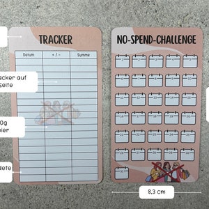 May include: A pink and white tracker card with the text "TRACKER" and "NO-SPEND-CHALLENGE" printed on it. The tracker card has a calendar with 31 days and a section for tracking expenses. The card is 8.3 cm wide and 14.5 cm tall.