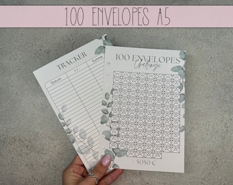 May include: A set of two printable sheets for a 100 envelopes challenge. The first sheet is a tracker with columns for date, plus or minus, and sum. The second sheet has a grid of 100 envelopes with the text "100 Envelopes Challenge" and "= 5050 €". Both sheets have a green leafy design.