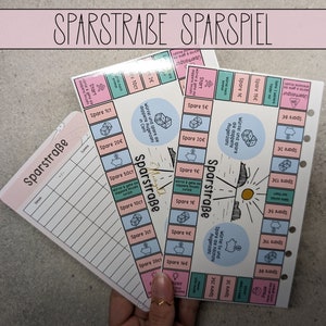 Sparstraße Sparspiel Set Sparchallenge Set Würfel Sparspiel und Tracker Challenge Sparen | A6 Zipper Umschlagmethode