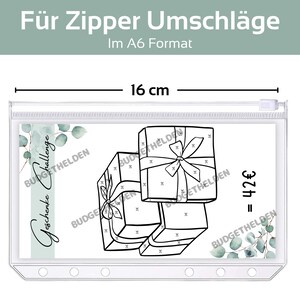 May include: A clear plastic zippered pouch with a white card inside. The card has a black and white illustration of two wrapped gifts with a bow on top. The card also has the text "Geschenke Challenge" and "32&euro;". The pouch is 8.4 inches by 16 inches.